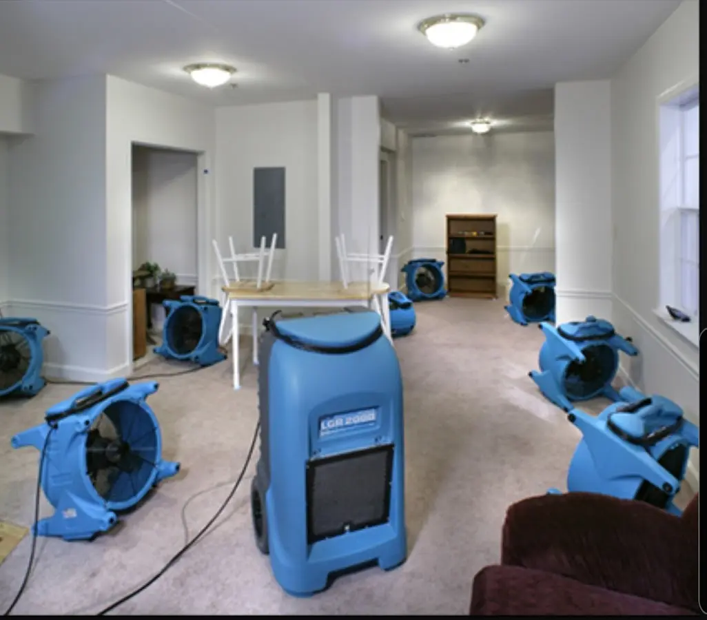 Air movers and dehumidifier setup for Water Damage Restoration in Roxboro